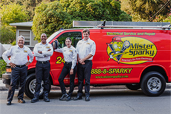 Mister Sparky employee with customer