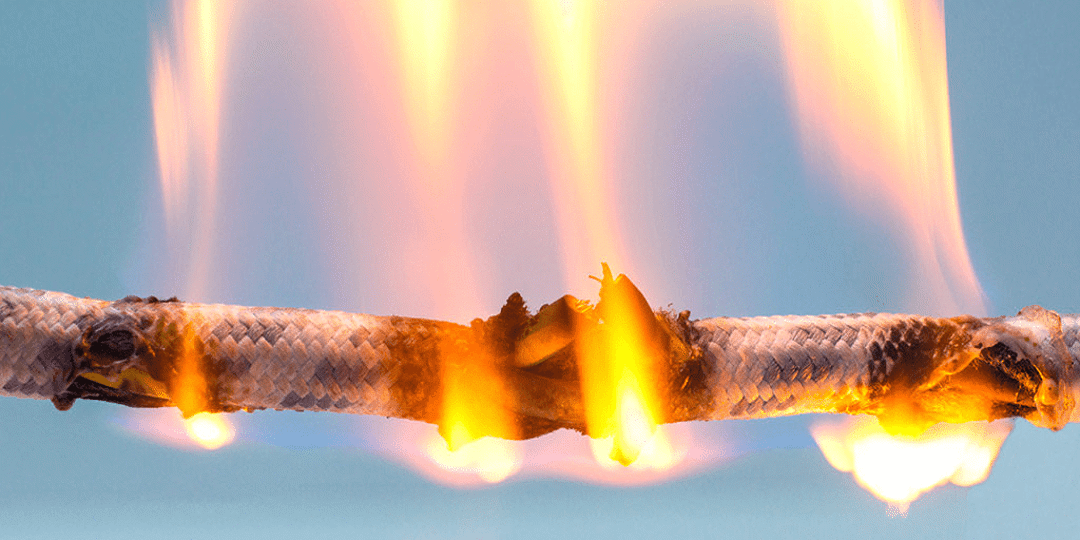 A photo of a wire on fire