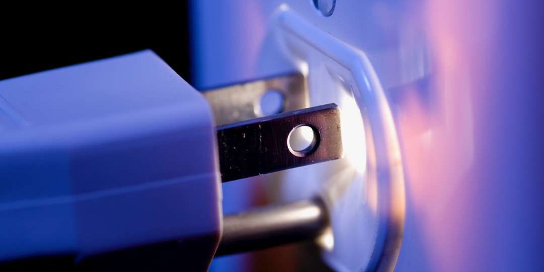 a plug going into an outlet