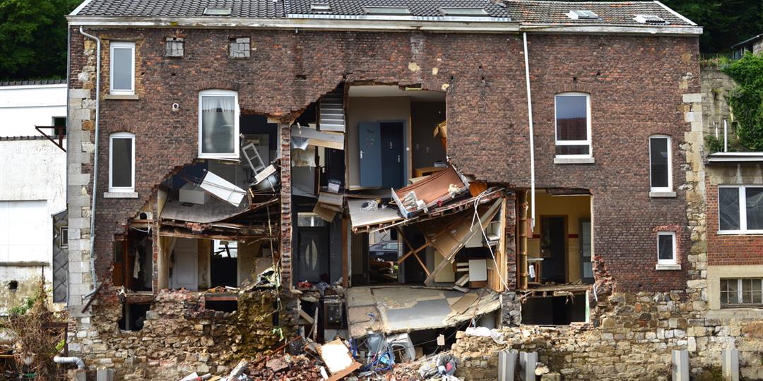 house falling apart from natural disaster