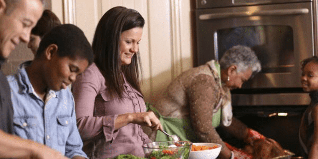 A family cooking during the holidays