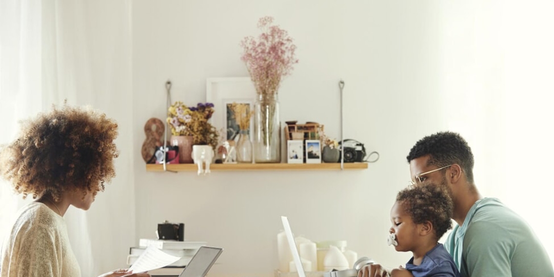 a photo of a family at the dinner table