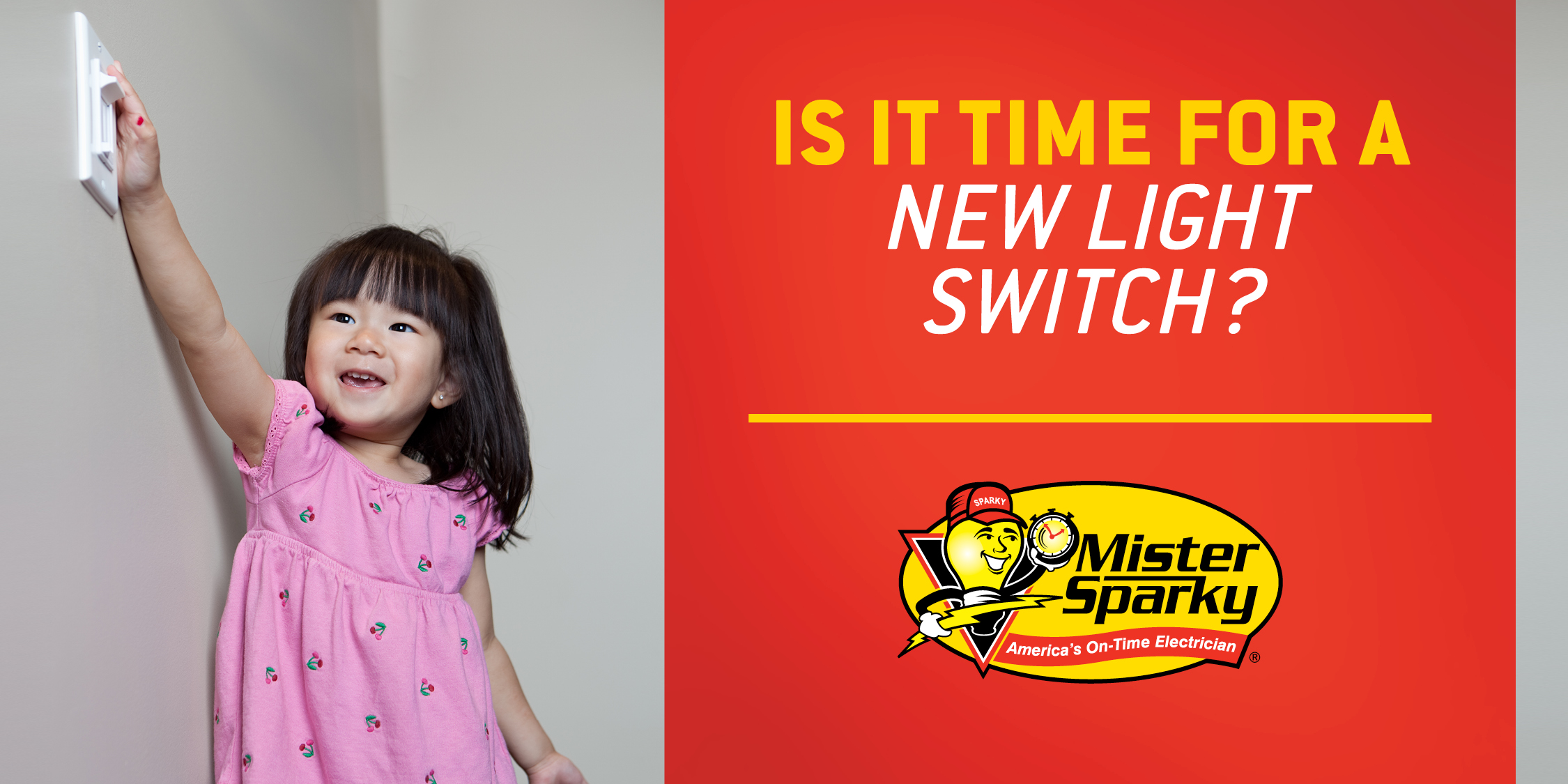 A young girl reaches up to turn off the light switch.